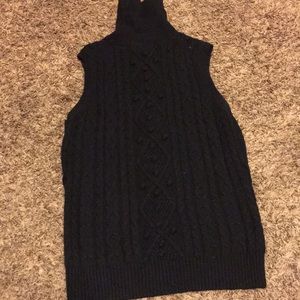 Knit sleeveless turtleneck